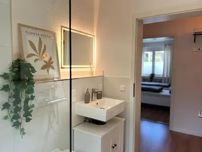 Ein Bett oder Betten in einem Zimmer der Unterkunft Apartments-Bad Harzburg, Zentrale Ferienwohnung