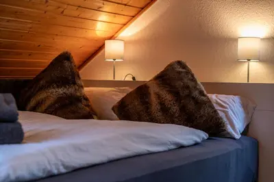 Ein Bett oder Betten in einem Zimmer der Unterkunft HIRSCH Stadt Apartment 5 - Parkplatz - Zentral