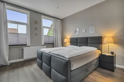 Ein Bett oder Betten in einem Zimmer der Unterkunft HIRSCH Apartment Luchs - zentral - modern - groß