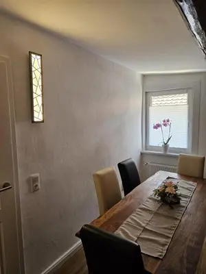 Ein Sitzbereich in der Unterkunft Ferienwohnung zu den Ilsefällen II