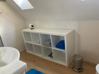 Ein Badezimmer in der Unterkunft Ferienwohnung Waldhöhe -sonniger Balkon-Boxspringbett-Ladestation E-Auto