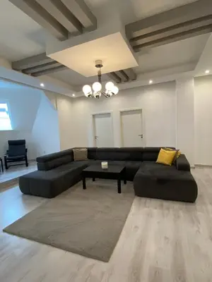 Ein Sitzbereich in der Unterkunft 4 Zimmer Design Atelier Wohnung