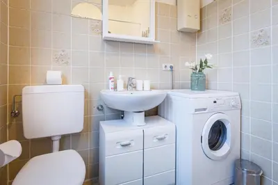 Ein Badezimmer in der Unterkunft HIRSCH Apartment Fuchsbau - zentral - Garten