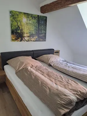 Ein Bett oder Betten in einem Zimmer der Unterkunft Ferienwohnung Else