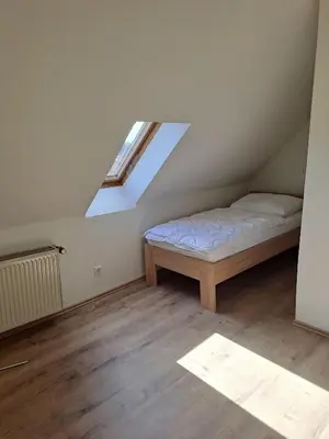 Ein Bett oder Betten in einem Zimmer der Unterkunft Ferienwohnung Else