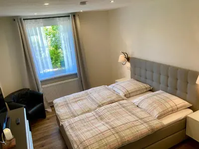 Ein Bett oder Betten in einem Zimmer der Unterkunft Haus Wilma