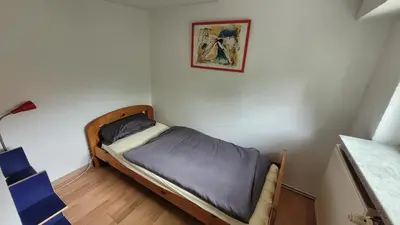 Ein Bett oder Betten in einem Zimmer der Unterkunft historisches Ferienhaus im Zentrum - für bis zu 7 Personen