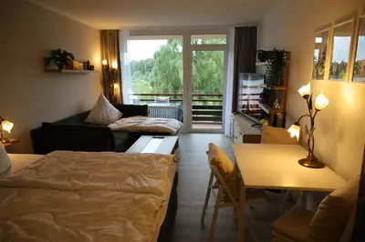 Ein Bett oder Betten in einem Zimmer der Unterkunft Böckchen - Vier Jahreszeiten
