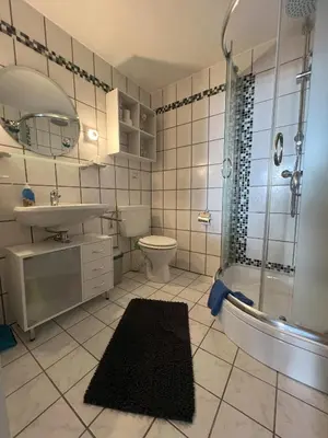 Ein Badezimmer in der Unterkunft Gemütliche Ferienwohnung Nr. 4 im Harz für 2 Personen