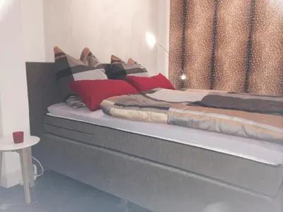 Ein Bett oder Betten in einem Zimmer der Unterkunft Ferien Suite Braunlage