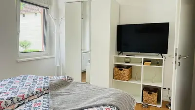 Ein Bett oder Betten in einem Zimmer der Unterkunft Ferienwohnung Nordmann 5