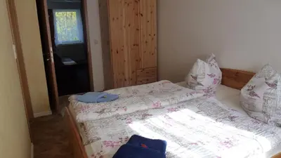 Ein Bett oder Betten in einem Zimmer der Unterkunft Ferienwohnung Rasch