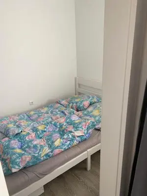 Ein Bett oder Betten in einem Zimmer der Unterkunft Apartment 3 502