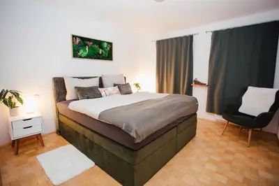 Ein Bett oder Betten in einem Zimmer der Unterkunft Exklusive Goethe-Suite am Brocken by Meis in Wernigerode Zentral