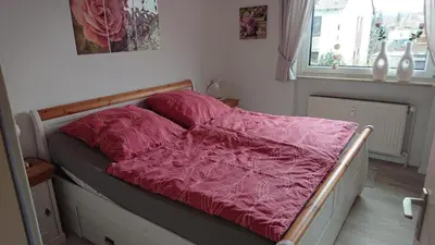 Ein Bett oder Betten in einem Zimmer der Unterkunft Ferienwohnung Danny