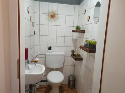 Ein Badezimmer in der Unterkunft Ferienwohnung am Hotel 
