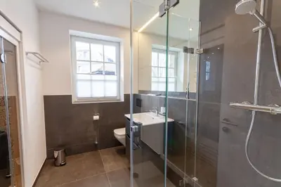 Ein Badezimmer in der Unterkunft Ferienwohnung Hirschmann 3 mit Sauna und Balkon