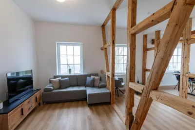 Ein Sitzbereich in der Unterkunft Ferienwohnung Hirschmann 5 mit Kamin