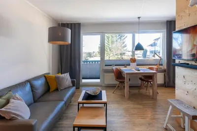Ein Sitzbereich in der Unterkunft Ferienwohnung BergChalet 2 mit Balkon
