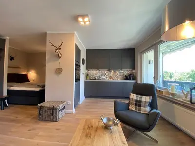 Ein Sitzbereich in der Unterkunft Ferienwohnung Bergchalet 3 mit Balkon