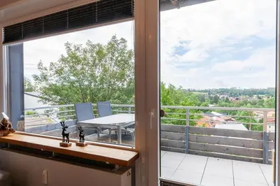 Ein Balkon oder eine Terrasse in der Unterkunft Ferienwohnung Aussichts-Punkt mit Wärmekabine und Traumblick