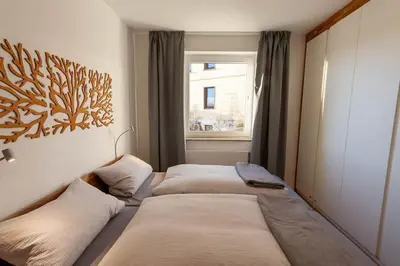 Ein Bett oder Betten in einem Zimmer der Unterkunft Fewo HochHarzHome mit Traumblick über Braunlage