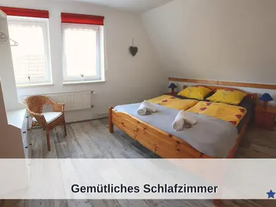 Ein Bett oder Betten in einem Zimmer der Unterkunft Okerstern