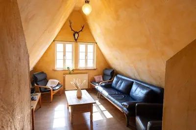 Ein Sitzbereich in der Unterkunft Ferienhaus am Glockenberg