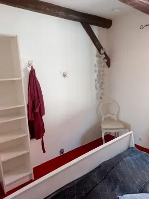 Ein Bett oder Betten in einem Zimmer der Unterkunft TheBackyard
