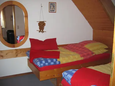 Ein Bett oder Betten in einem Zimmer der Unterkunft Appartements Am Hexenstieg