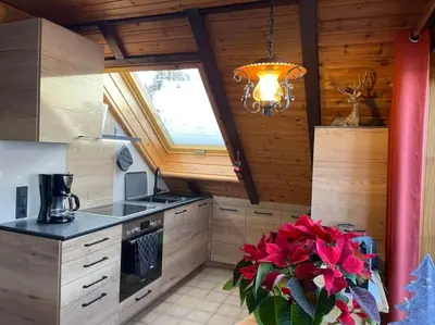 Küche/Küchenzeile in der Unterkunft Blockhausflair mit Kamin, Balkon und Bergpanorama