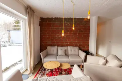 Ein Sitzbereich in der Unterkunft Ferienwohnung Garten Loft im Haus Tannenblick Lofts