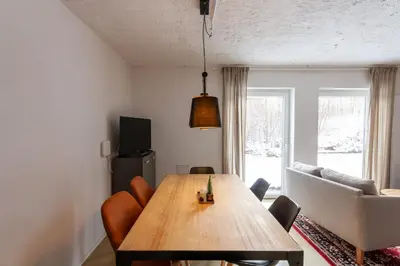 Ein Sitzbereich in der Unterkunft Ferienwohnung Garten Loft im Haus Tannenblick Lofts