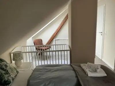 Ein Bett oder Betten in einem Zimmer der Unterkunft Haus Bergstadtblick Fewo Auszeit