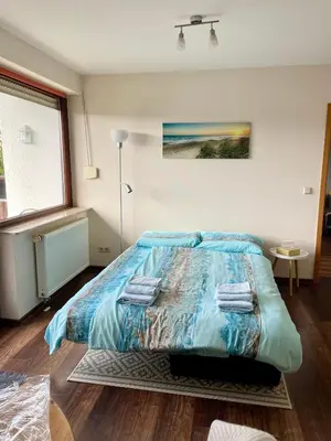 Ein Bett oder Betten in einem Zimmer der Unterkunft Ferienwohnung Laura