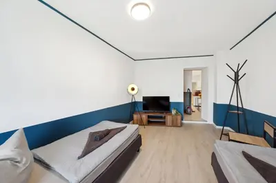 Ein Sitzbereich in der Unterkunft Wohnung Stadtrand, 4 Personen, nahe Bahnhof und See