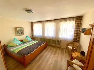Ein Bett oder Betten in einem Zimmer der Unterkunft Ferienwohnung GARTENBLICK im HAUS GERLACH