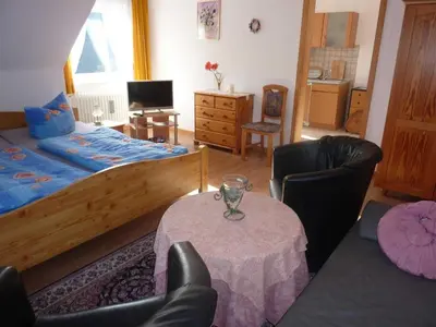 Ein Bett oder Betten in einem Zimmer der Unterkunft Ferienwohnung Brüggemann