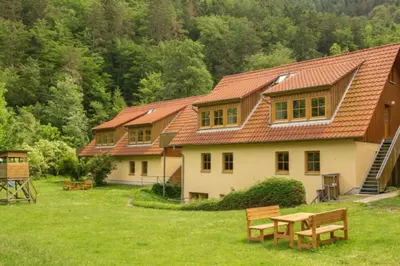 Ein Garten an der Unterkunft Ferienwohnung Ferienhäuser am Brocken, 60 qm, 2 Schlafzimmer