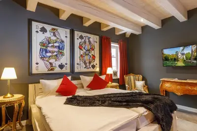 Ein Bett oder Betten in einem Zimmer der Unterkunft Ferienhaus Ilsenburg, luxuriöse Landhäuser mit Sauna und Kamin, mitten im Harz