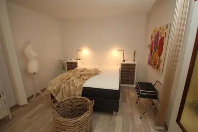 Ein Bett oder Betten in einem Zimmer der Unterkunft Ferienwohnung 