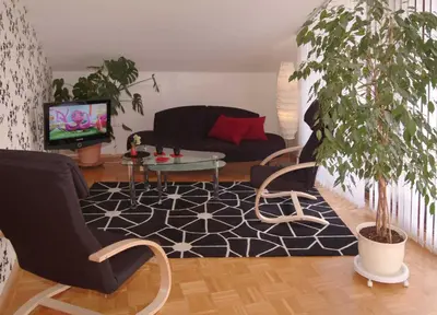 Ein Sitzbereich in der Unterkunft Ferienwohnung Zum Waldseebad