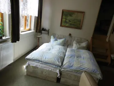 Ein Bett oder Betten in einem Zimmer der Unterkunft Ferienwohnungen im Harz