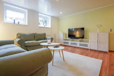 TV/Unterhaltungsangebot in der Unterkunft Ferienwohnung Emma - Gemütliche Wohnung mit Terrasse