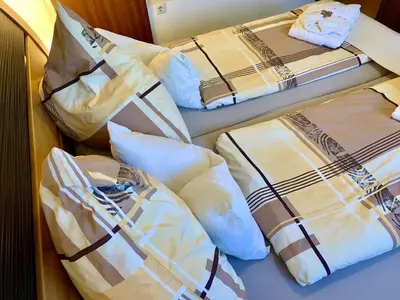 Ein Bett oder Betten in einem Zimmer der Unterkunft Ferienwohnung Köhnke 3