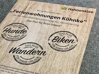 Ein Zertifikat, Auszeichnung, Logo oder anderes Dokument, das in der Unterkunft Köhnke 4 Comfortable holiday residence ausgestellt ist