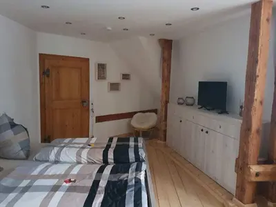 Ein Bett oder Betten in einem Zimmer der Unterkunft Stiftsblick Comfortable holiday residence