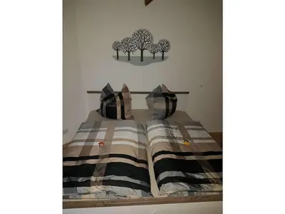 Ein Bett oder Betten in einem Zimmer der Unterkunft Stiftsblick Comfortable holiday residence