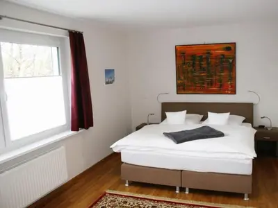 Ein Bett oder Betten in einem Zimmer der Unterkunft Sonnenwinkel Comfortable holiday residence