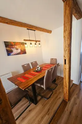 Ein Sitzbereich in der Unterkunft Ferienhaus zu den Ilsefällen